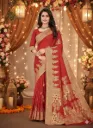 Red saree adorned with rich golden zari work